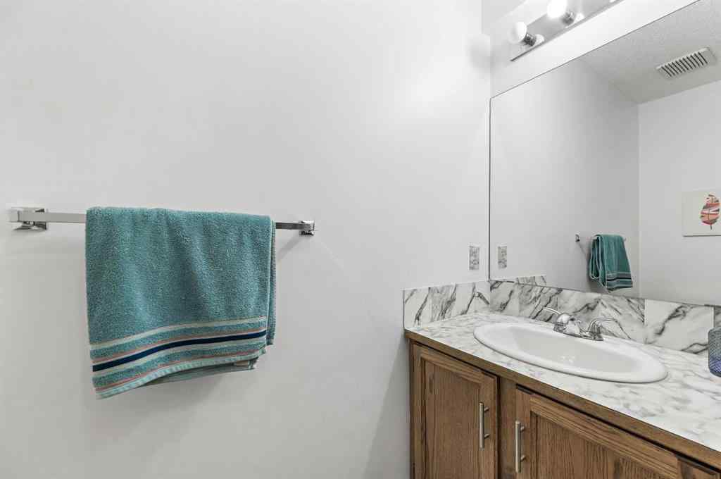 MLS® A2261056 - 24 Laguna Close NE in Monterey Park Calgary, Residential