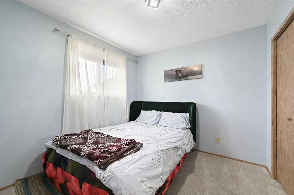 MLS® A2261056 - 24 Laguna Close NE in Monterey Park Calgary, Residential