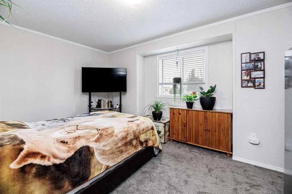 MLS® A2261091 - Unit #65 4922 Womacks   in Broadway Village Mobile Home Park Blackfalds, Mobile