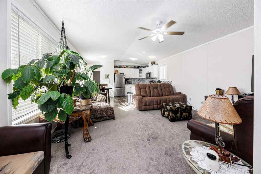 MLS® A2261091 - Unit #65 4922 Womacks   in Broadway Village Mobile Home Park Blackfalds, Mobile