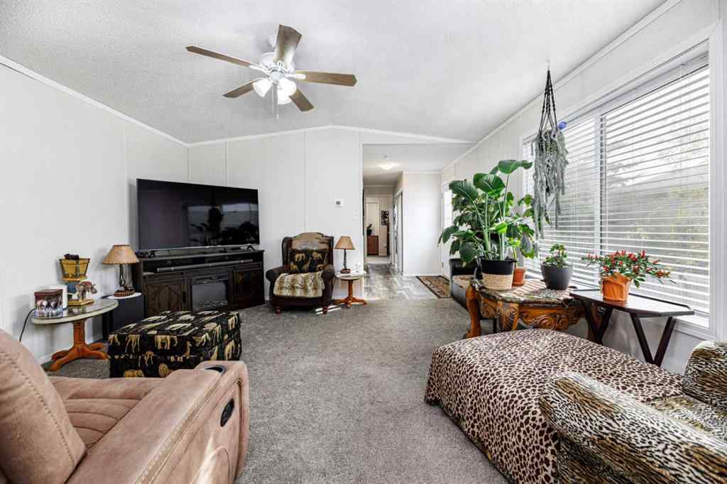 MLS® A2261091 - Unit #65 4922 Womacks   in Broadway Village Mobile Home Park Blackfalds, Mobile