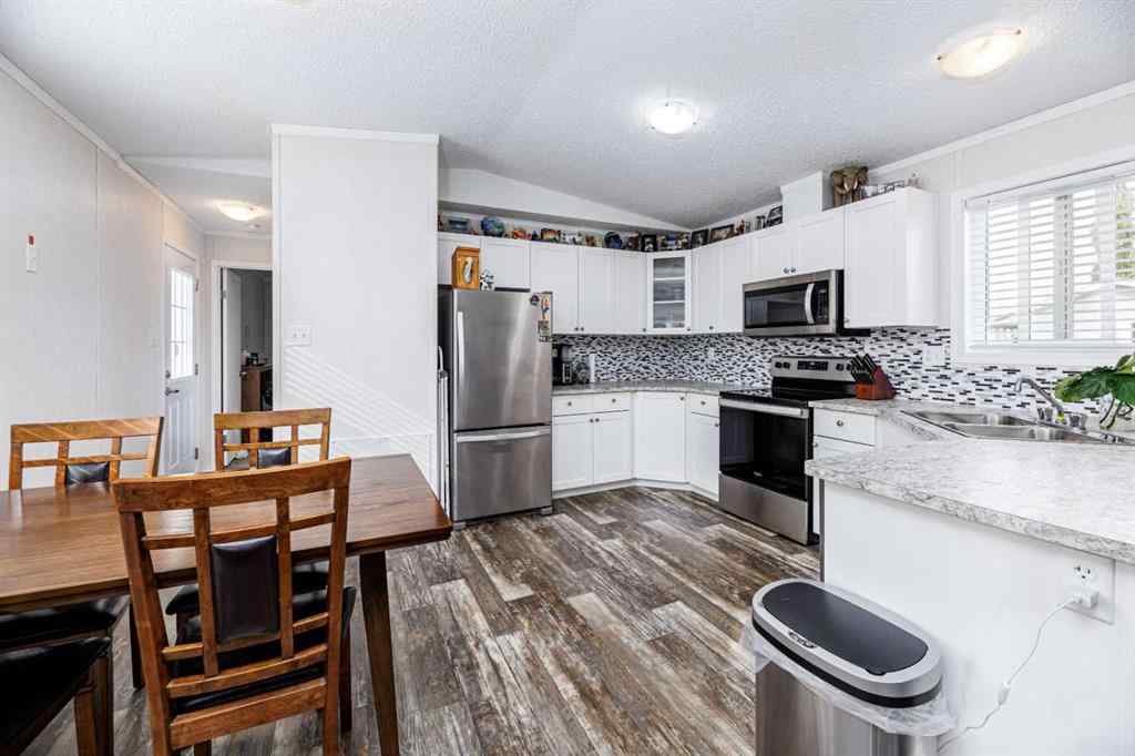 MLS® A2261091 - Unit #65 4922 Womacks   in Broadway Village Mobile Home Park Blackfalds, Mobile