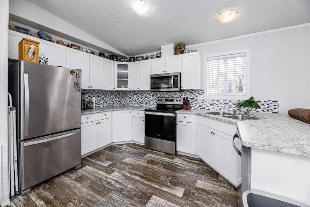 MLS® A2261091 - Unit #65 4922 Womacks   in Broadway Village Mobile Home Park Blackfalds, Mobile