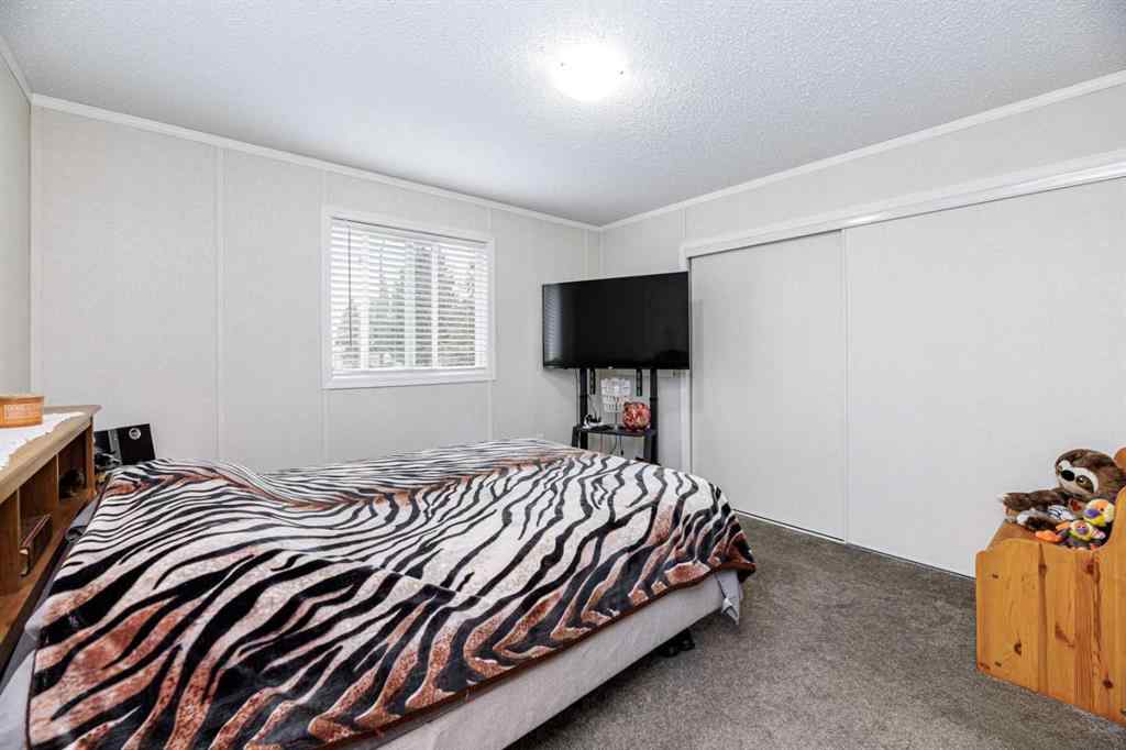 MLS® A2261091 - Unit #65 4922 Womacks   in Broadway Village Mobile Home Park Blackfalds, Mobile