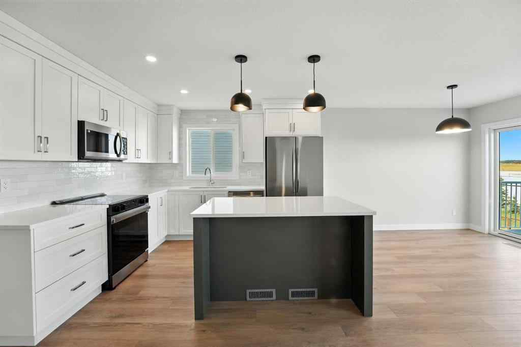 MLS® A2261112 - 54 Vista Close  in Valley Ridge Blackfalds, Residential