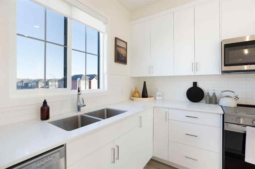 MLS&reg; # A2261118 - 92 Creekside Drive SW in Pine Creek Calgary, Residential Open Houses