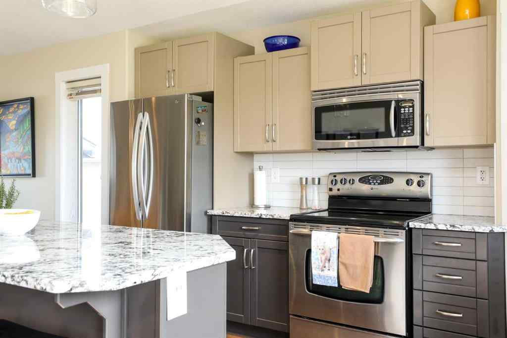 MLS® A2261120 - 436 Mt Sunburst Crescent W in Sunridge Lethbridge, Residential