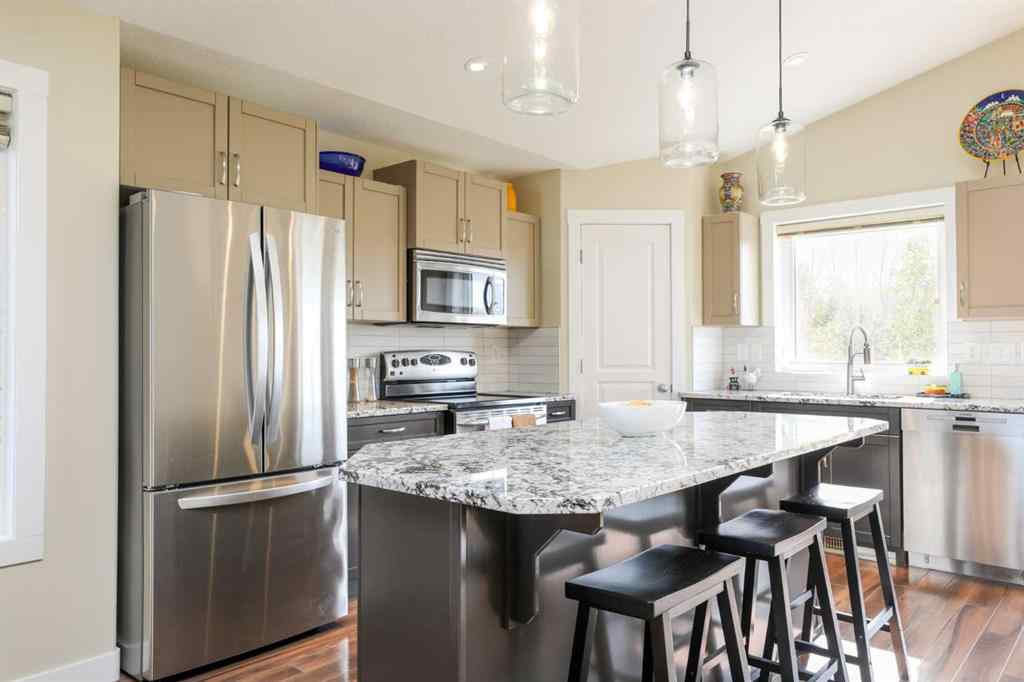 MLS® A2261120 - 436 Mt Sunburst Crescent W in Sunridge Lethbridge, Residential