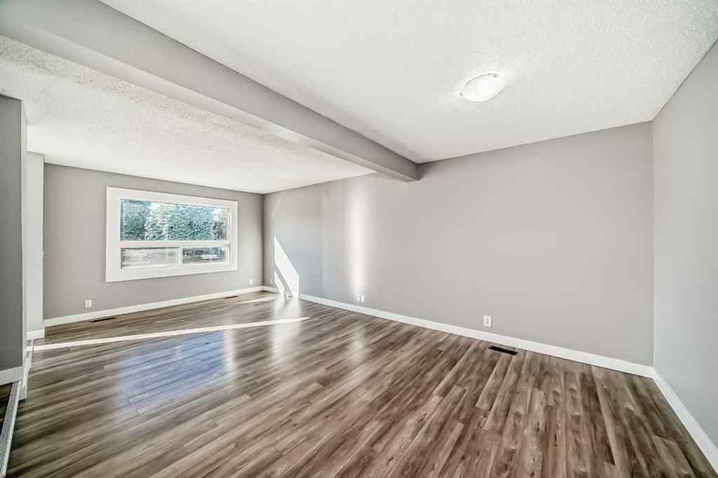 MLS® A2261149 - 327 Falshire Way NE in Falconridge Calgary, Residential