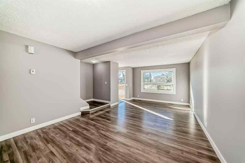 MLS® A2261149 - 327 Falshire Way NE in Falconridge Calgary, Residential