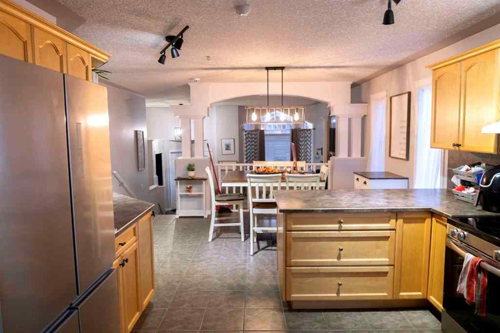 MLS® A2261211 - 12413 105 Street E in Royal Oaks Grande Prairie, Residential