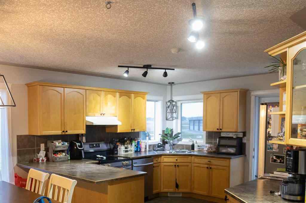 MLS® A2261211 - 12413 105 Street E in Royal Oaks Grande Prairie, Residential