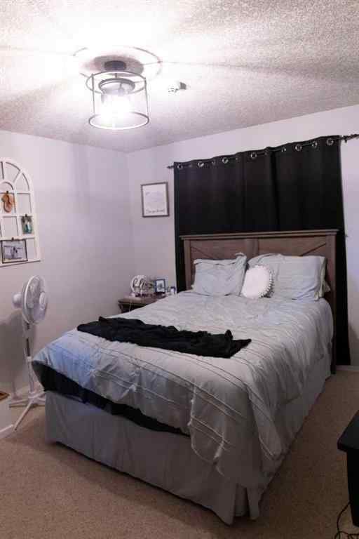 MLS® A2261211 - 12413 105 Street E in Royal Oaks Grande Prairie, Residential