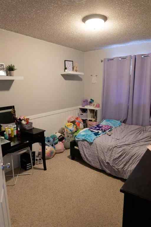 MLS® A2261211 - 12413 105 Street E in Royal Oaks Grande Prairie, Residential