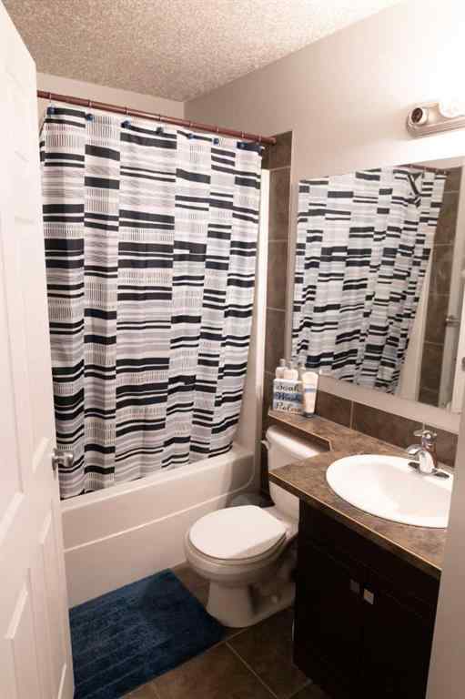 MLS® A2261211 - 12413 105 Street E in Royal Oaks Grande Prairie, Residential