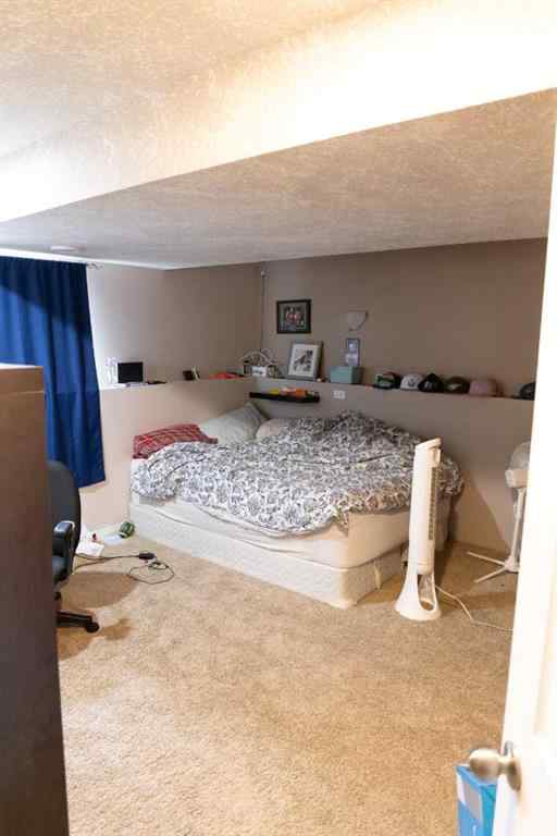 MLS® A2261211 - 12413 105 Street E in Royal Oaks Grande Prairie, Residential