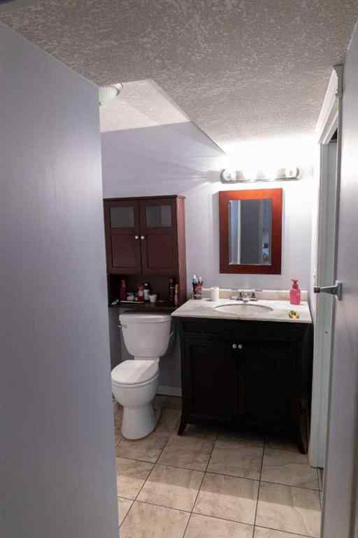 MLS® A2261211 - 12413 105 Street E in Royal Oaks Grande Prairie, Residential