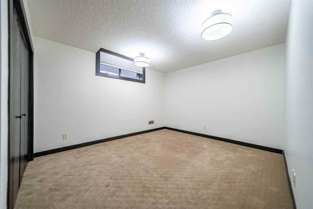 MLS® A2261227 - 73 Quarry Way SE in Douglasdale/Glen Calgary, Residential