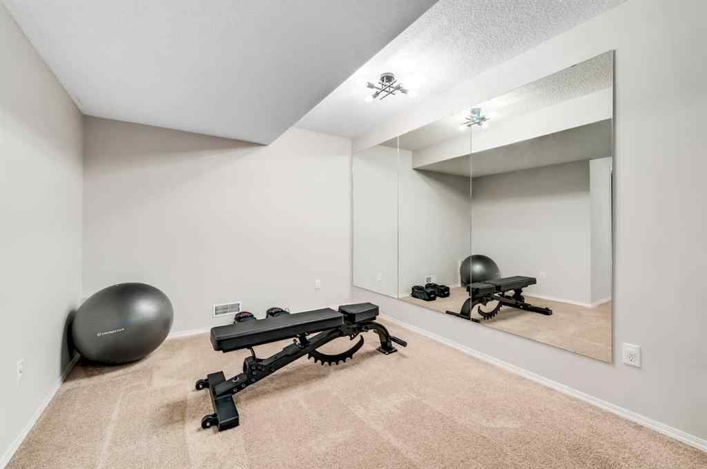 MLS® A2261244 - 1 Cougarstone Villas SW in Cougar Ridge Calgary, Residential