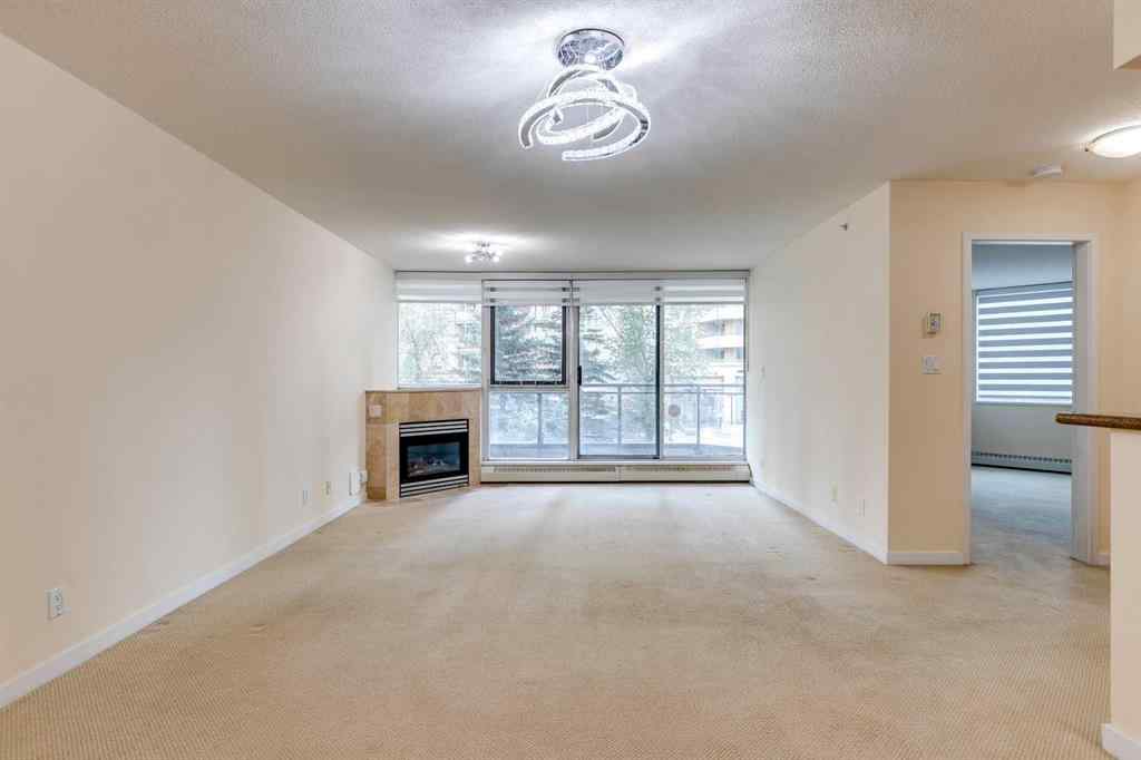 MLS® A2261272 - Unit #209 1108 6 Avenue SW in Downtown West End Calgary, Residential
