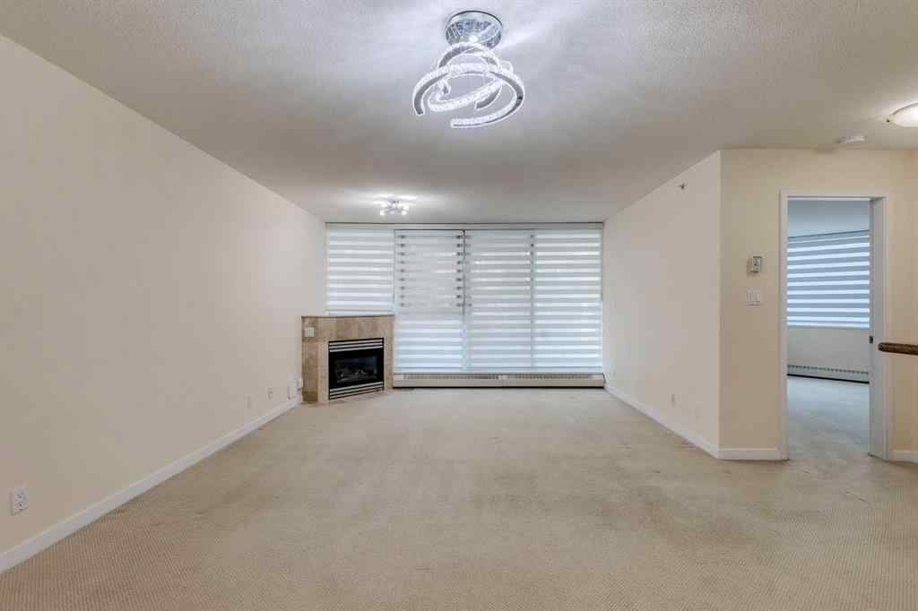 MLS® A2261272 - Unit #209 1108 6 Avenue SW in Downtown West End Calgary, Residential