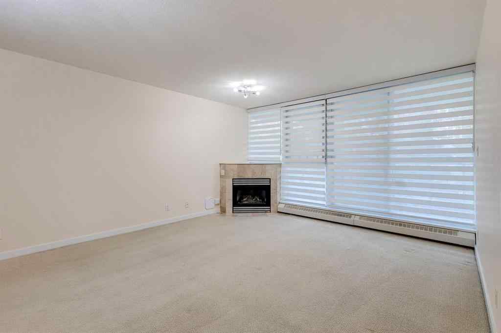 MLS® A2261272 - Unit #209 1108 6 Avenue SW in Downtown West End Calgary, Residential