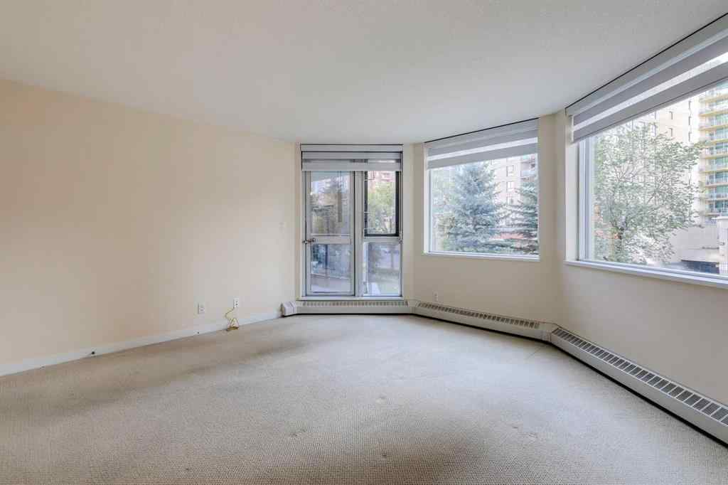 MLS® A2261272 - Unit #209 1108 6 Avenue SW in Downtown West End Calgary, Residential