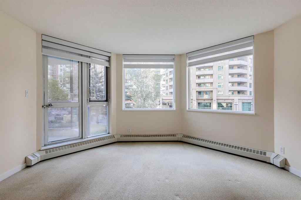 MLS® A2261272 - Unit #209 1108 6 Avenue SW in Downtown West End Calgary, Residential