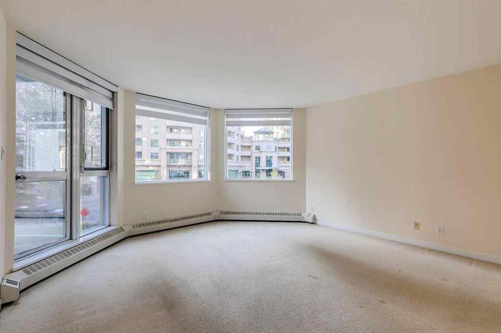 MLS® A2261272 - Unit #209 1108 6 Avenue SW in Downtown West End Calgary, Residential