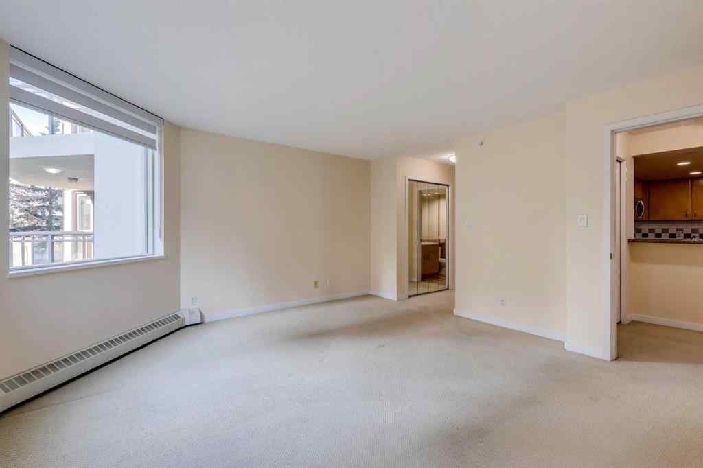 MLS® A2261272 - Unit #209 1108 6 Avenue SW in Downtown West End Calgary, Residential