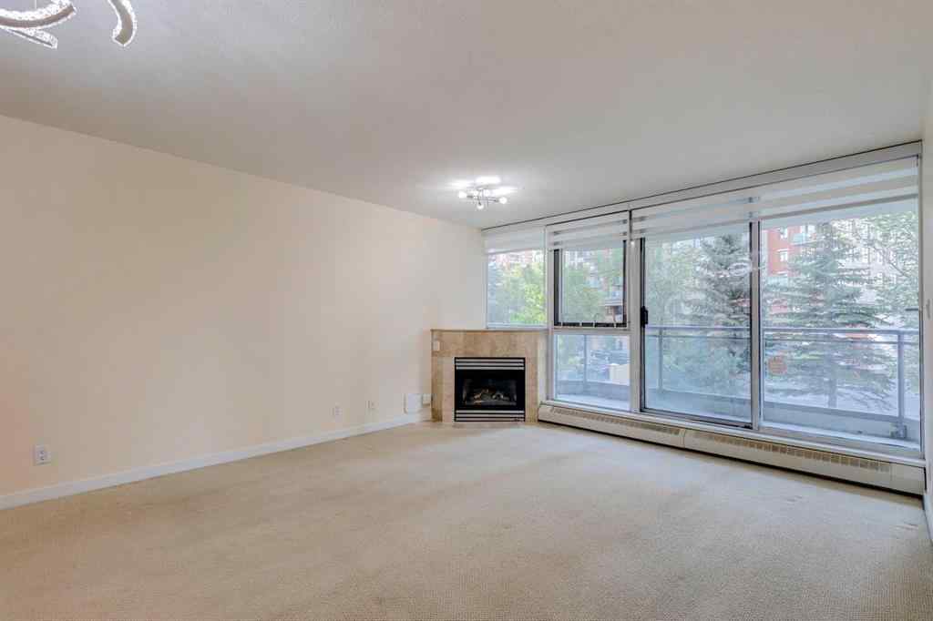 MLS® A2261272 - Unit #209 1108 6 Avenue SW in Downtown West End Calgary, Residential
