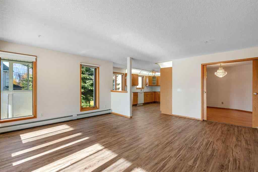 MLS® A2261309 - Unit #135 7229 Sierra Morena Boulevard SW in Signal Hill Calgary, Residential