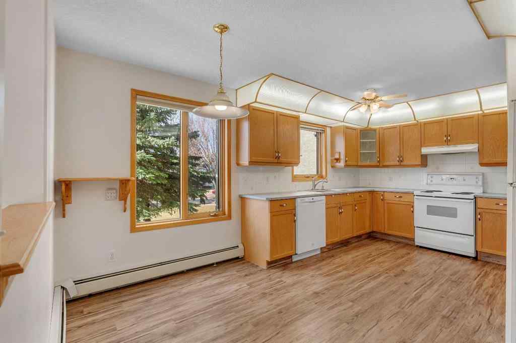 MLS® A2261309 - Unit #135 7229 Sierra Morena Boulevard SW in Signal Hill Calgary, Residential
