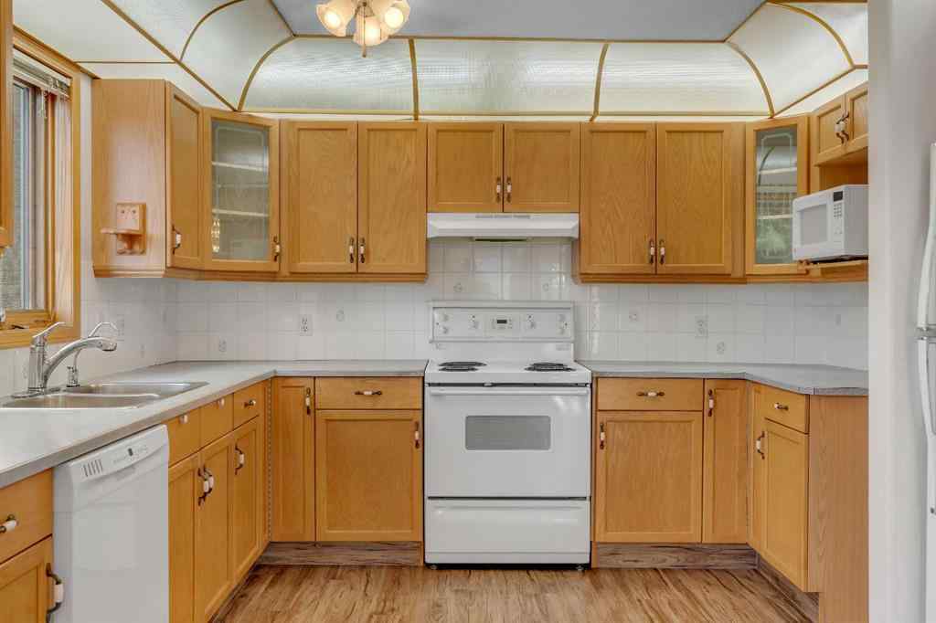 MLS® A2261309 - Unit #135 7229 Sierra Morena Boulevard SW in Signal Hill Calgary, Residential