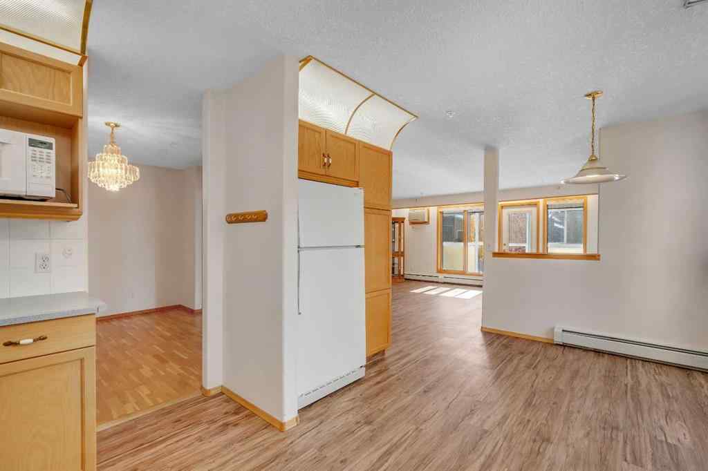 MLS® A2261309 - Unit #135 7229 Sierra Morena Boulevard SW in Signal Hill Calgary, Residential