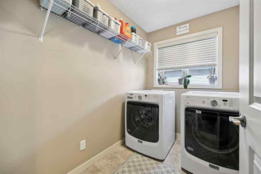 MLS® A2261327 - 272 Kingsmere Cove SE in Kings Heights Airdrie, Residential