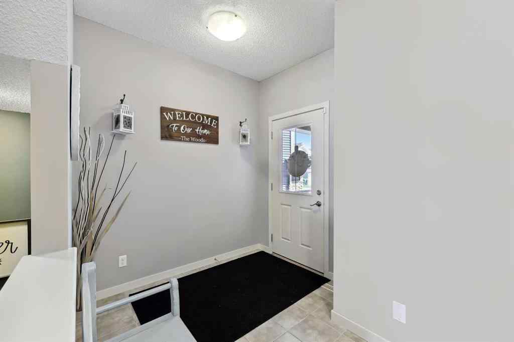 MLS® A2261327 - 272 Kingsmere Cove SE in Kings Heights Airdrie, Residential