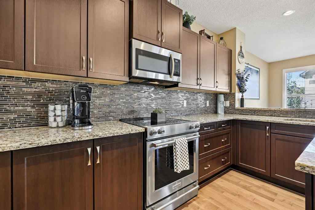 MLS® A2261327 - 272 Kingsmere Cove SE in Kings Heights Airdrie, Residential