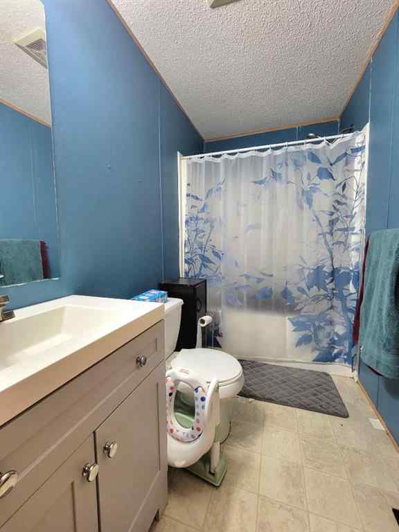 MLS® A2261328 - 8707 90 Street  in Creekside Grande Prairie, Residential