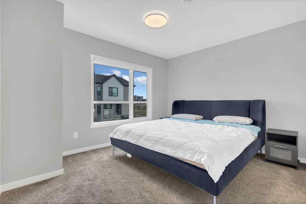 MLS® A2261369 - Unit #404 20295 Seton Way SE in Seton Calgary, Residential