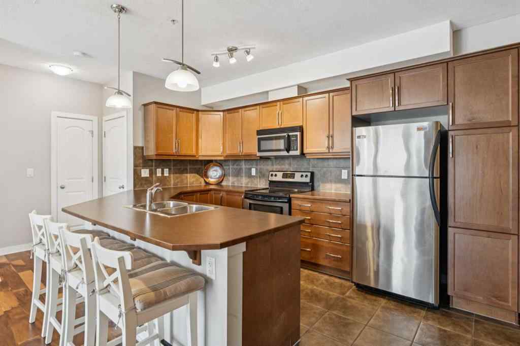 MLS® A2261370 - Unit #215 15304 Bannister Road SE in Midnapore Calgary, Residential