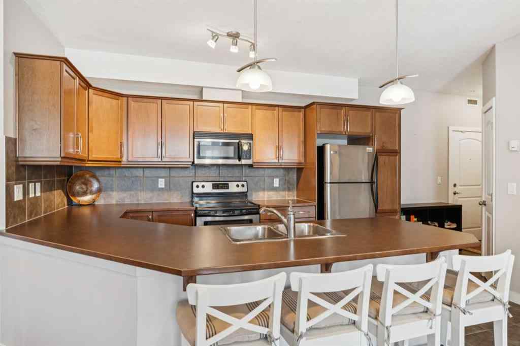 MLS® A2261370 - Unit #215 15304 Bannister Road SE in Midnapore Calgary, Residential