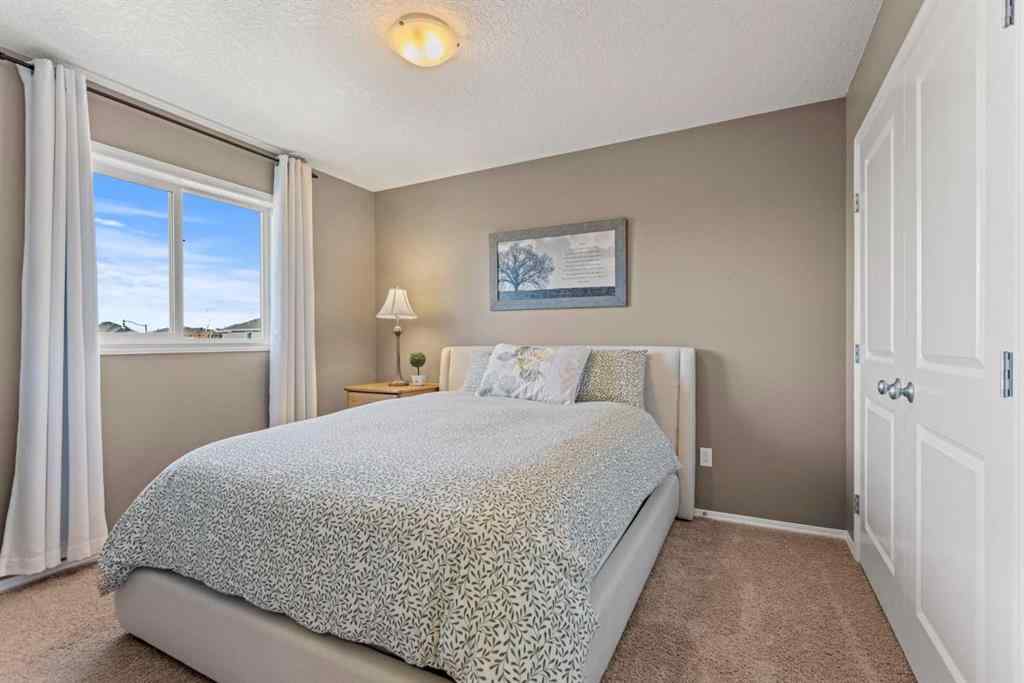 MLS® A2261398 - 103 Drake Landing Heath  in Drake Landing Okotoks, Residential