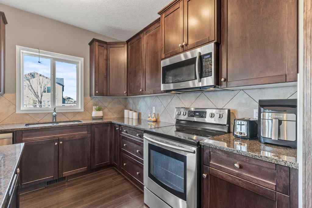 MLS® A2261398 - 103 Drake Landing Heath  in Drake Landing Okotoks, Residential