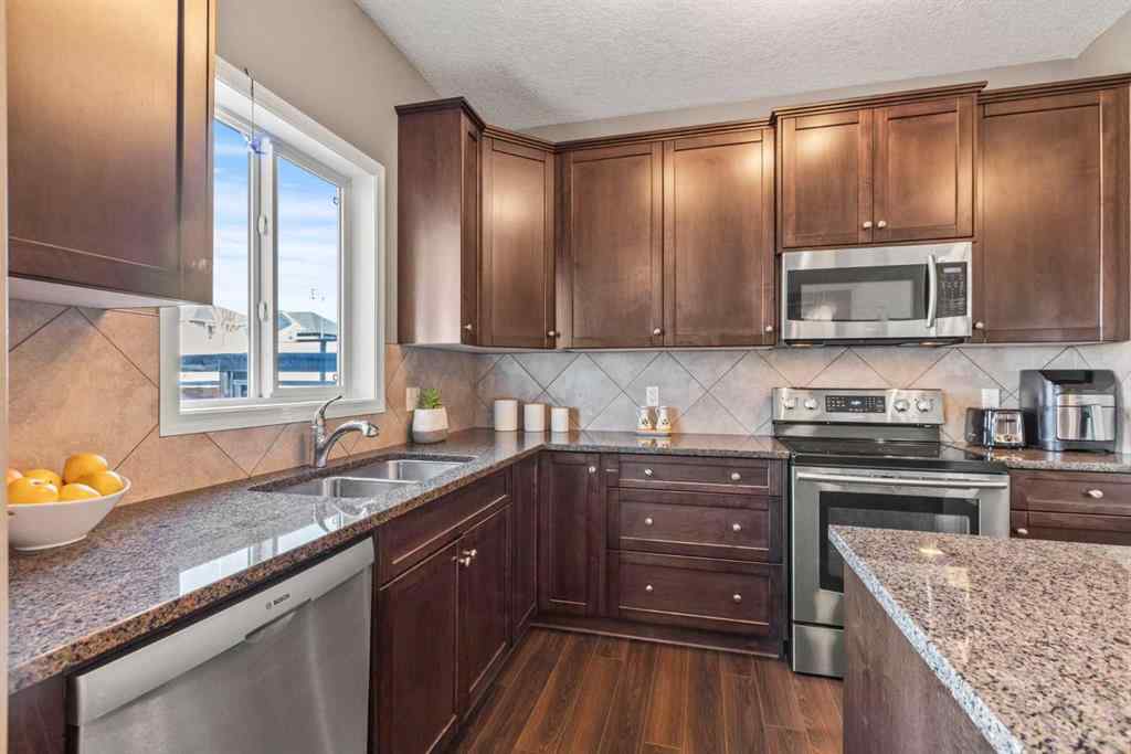 MLS® A2261398 - 103 Drake Landing Heath  in Drake Landing Okotoks, Residential