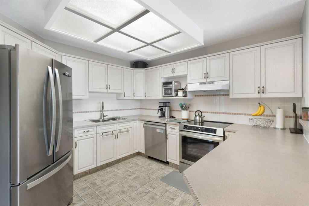 MLS® A2261430 - Unit #202 4944 8 Avenue SW in Westgate Calgary, Residential