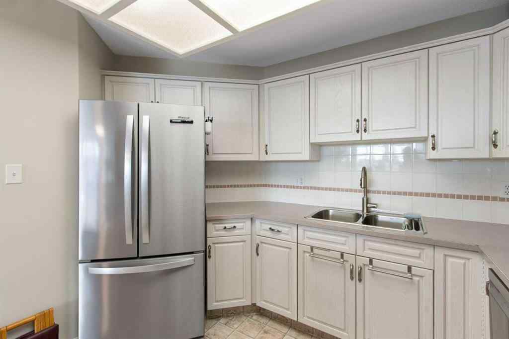 MLS® A2261430 - Unit #202 4944 8 Avenue SW in Westgate Calgary, Residential