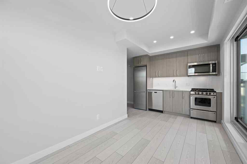 MLS® A2261438 - Unit #402 110 18A Street NW in West Hillhurst Calgary, Residential