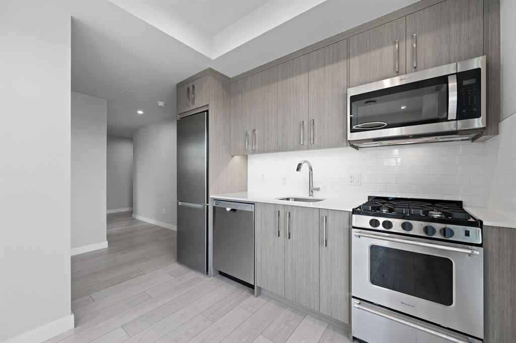 MLS® A2261438 - Unit #402 110 18A Street NW in West Hillhurst Calgary, Residential