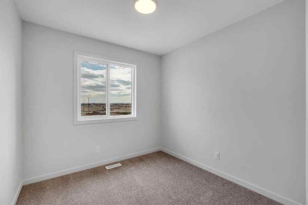 MLS® A2261439 - 1497 Rangeview Drive SE in Rangeview Calgary, Residential
